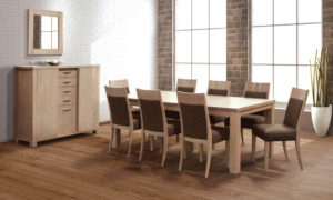 Light wooden rectangular table with wooden and brown upholstered chairs.