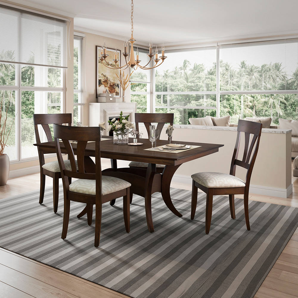 Modern rectangular wood dining table with upholstered wooden chairs.