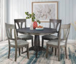Saloom Chelsea Round-Dining Set Round wooden dining table and upholstered wood chairs.